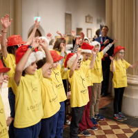 Photo of children singing a song at a Christmas concert