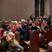 Photo of crowd cheering